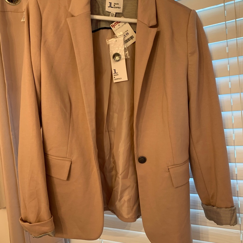 Pink blazer with black and white cuffs